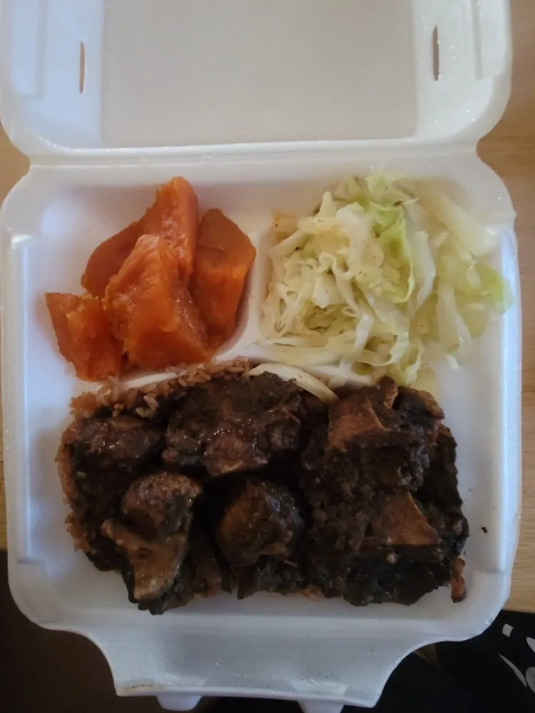 Ox Tails over Rice and Peas with Yams and Cabbage